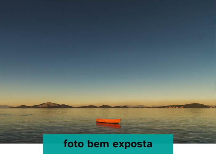Foto de um barquinho laranja com a exposição correta